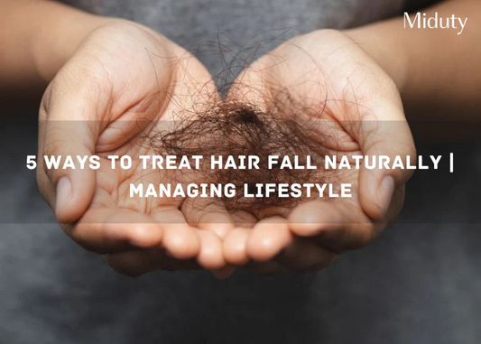 Hands holding fallen hair strands with text overlay about treating hair fall naturally