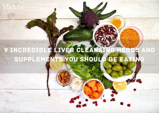 Variety of liver cleansing herbs and supplements including vegetables, nuts, and legumes on a wooden surface.