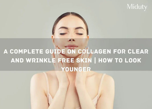Woman with smooth skin gently touching her face, looking serene