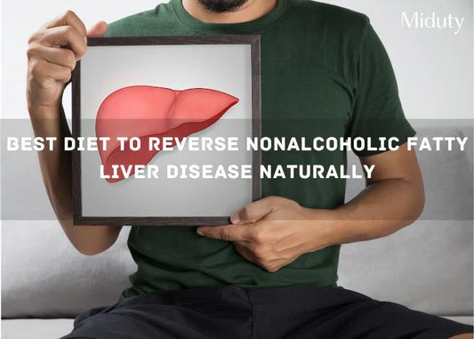 Person holding a framed illustration of a liver with text about reversing fatty liver disease