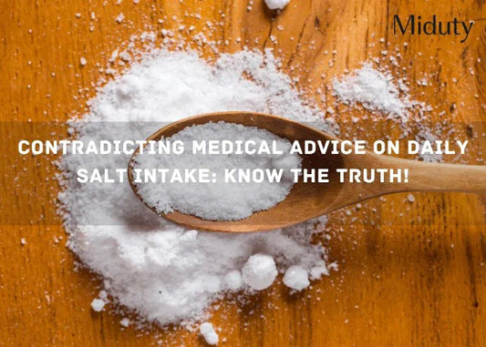 Wooden spoon holding salt on a wooden surface