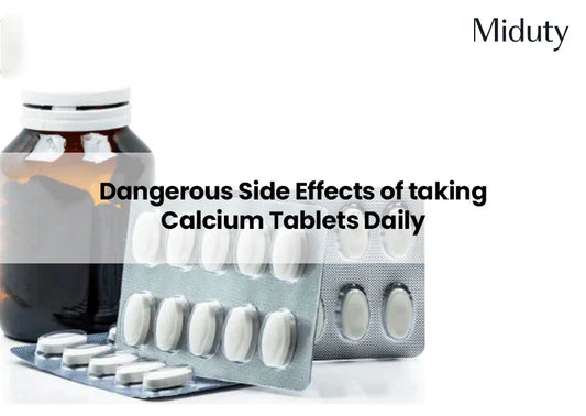 Calcium tablets in blister pack with a bottle in the background