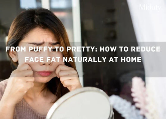 A woman making a facial expression while looking in the mirror, discussing face fat reduction.