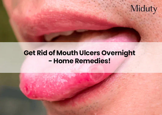 Close-up of a tongue showing mouth ulcers with a blurred background.