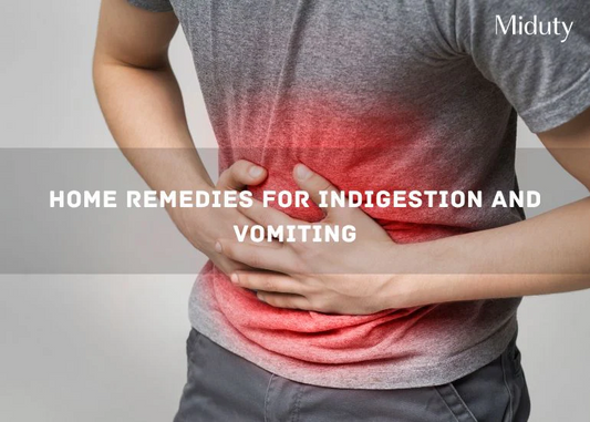Person holding their stomach in discomfort, with red highlighting indicating pain