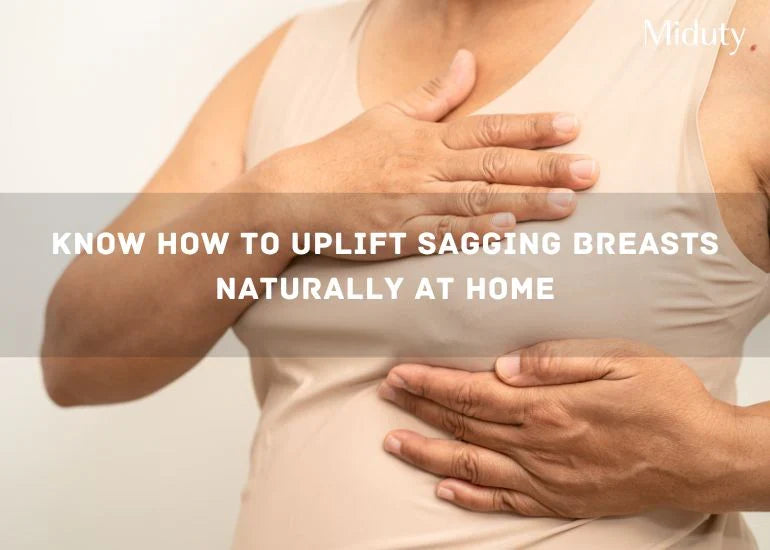 Person wearing a beige top with one hand on their chest, promoting natural breast uplift methods.