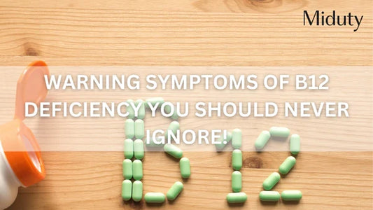 Text arranged to say 'B12' made from pills on a wooden surface with a bottle opening nearby.