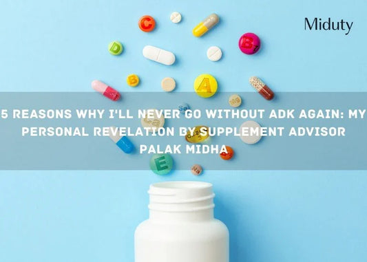Colorful pills and capsules arranged around a white supplement bottle on a blue background