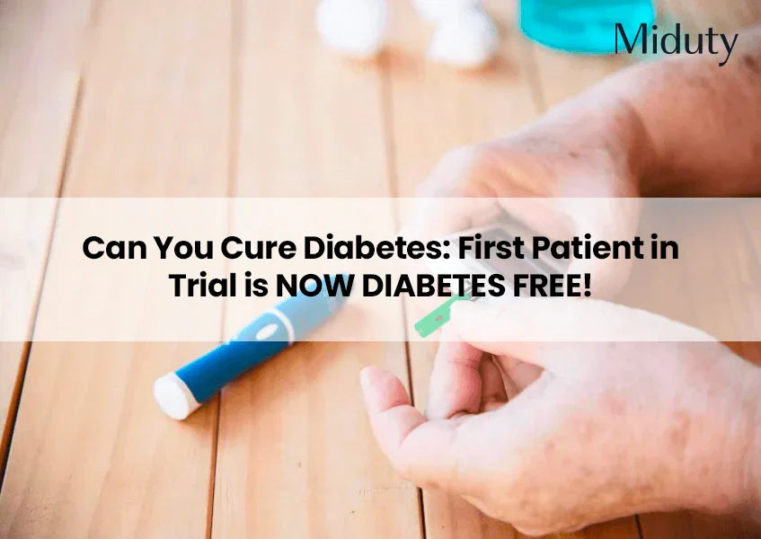 Person's hands using a glucose meter on a wooden table